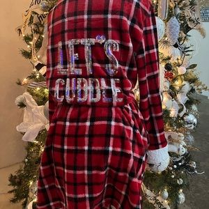 One size cozy with sequin robe has side pockets and a hood